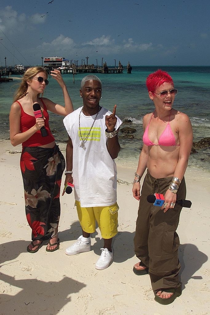 Moore, Sisqo, and Pink hanging out together at MTV's Spring Break some...