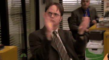 Dwight from &quot;The Office&quot; clapping in an exaggerated motion.