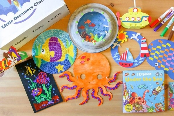 A drawing of an octopus and other crafts, craft supplies, and children&#x27;s books