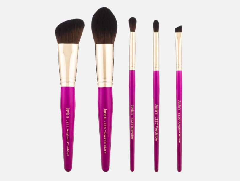 Five magenta contouring, tapered, blender, angled, and precision brushes that say &quot;Juvia&#x27;s Place&quot;