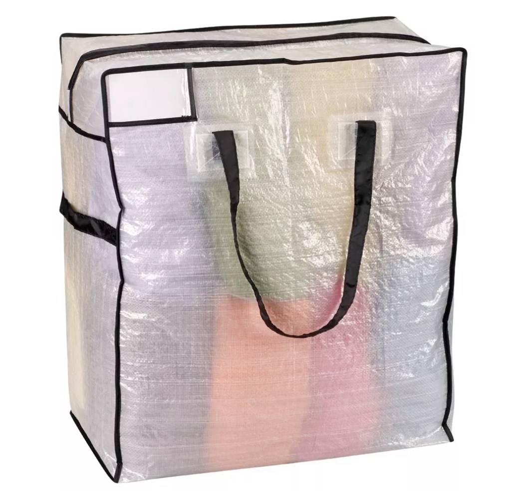 a oversized clear storage tote with black handles