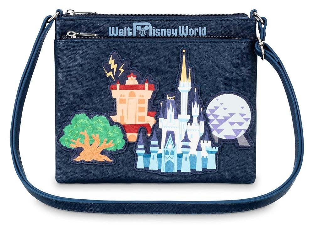 The navy bag, featuring die-cut appliqués of iconic Disney World attractions