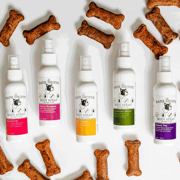A gif of all five dog body sprays moving up and down around bone-shaped dog treats