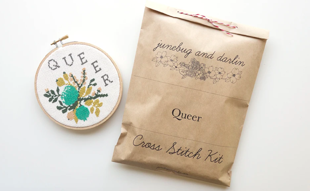 A cross stitch kit that reads &quot;Queer&quot;