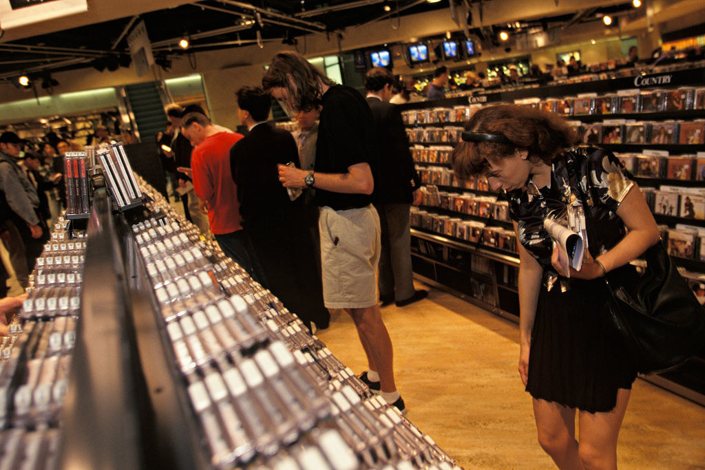 People looking around the CD section of a &#x27;90s Virgin Megastore