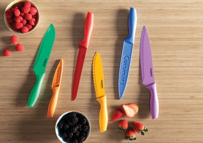 The green, orange, red, yellow, blue, and purple knives