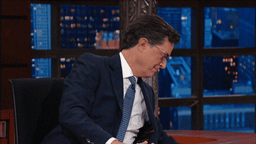 Steven Colbert using hand sanitizer on &quot;The Colbert Show.&quot;