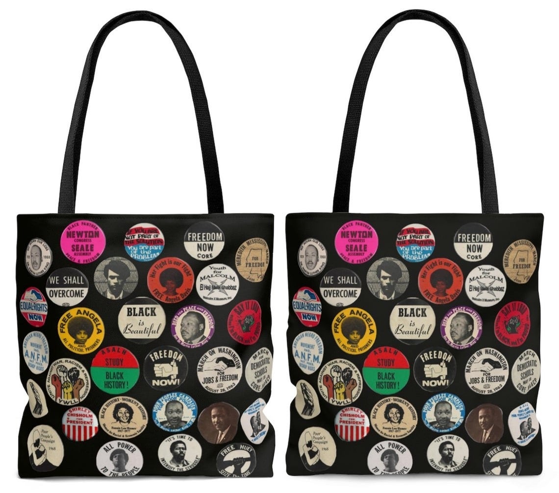 The Black History Tote Bag covered in buttons of notable American history. 