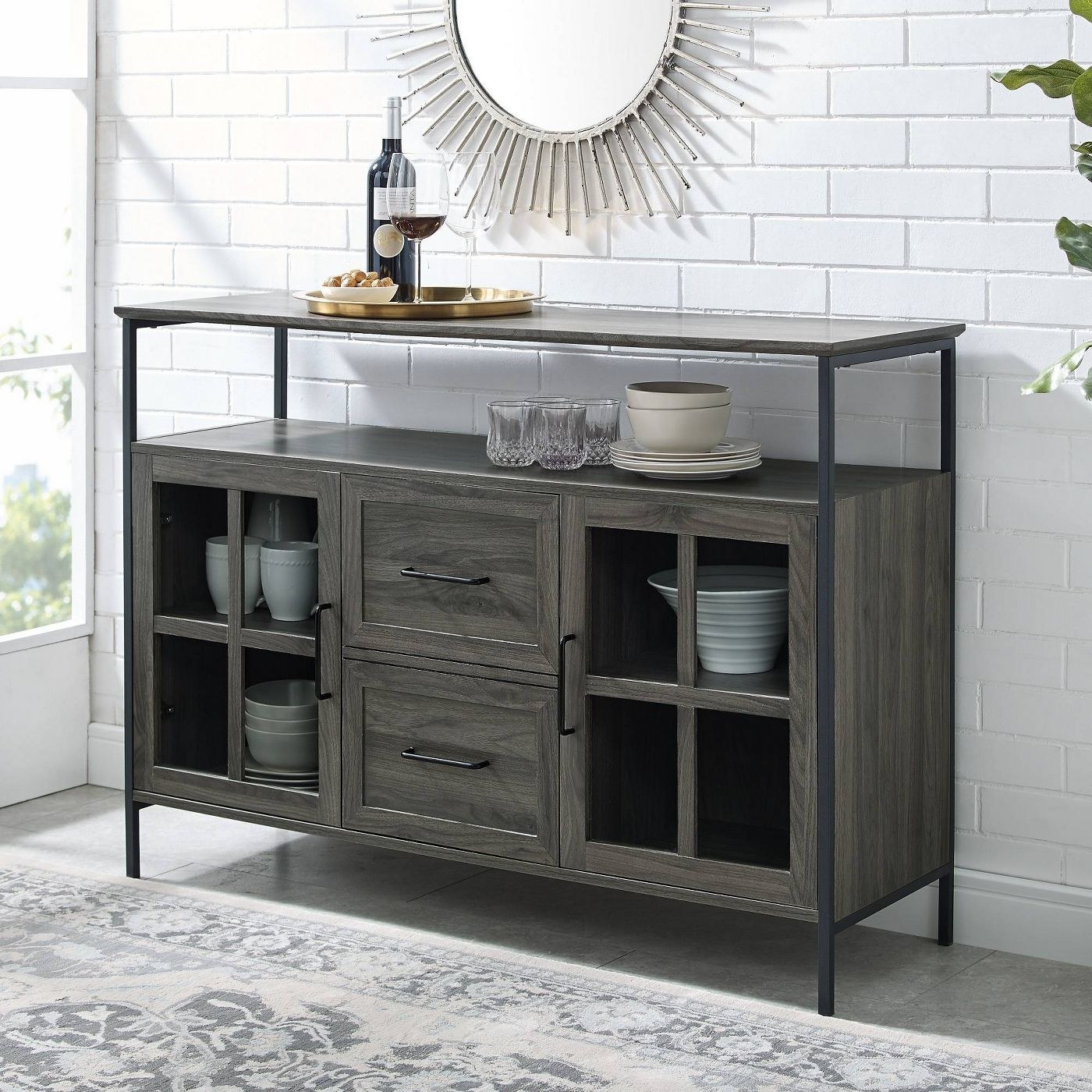 a greyish-brown buffet table with two tiers and lots of storage underneath