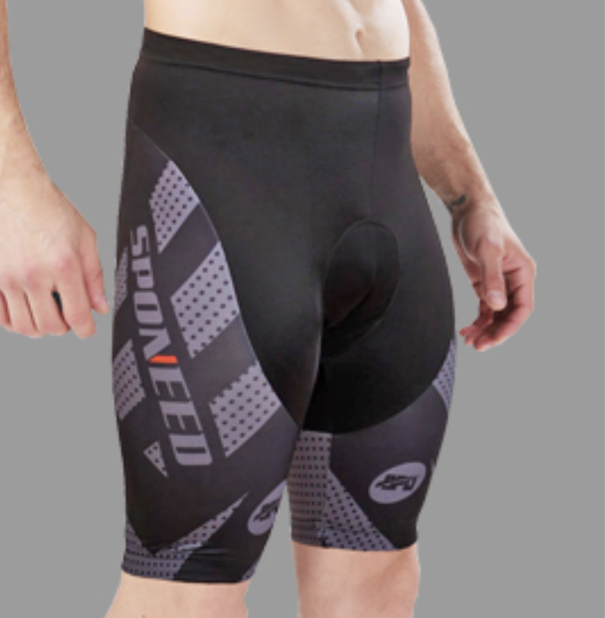 A model in black bike shorts with gray detailing on the &quot;Sponeed&quot; logo on the side 