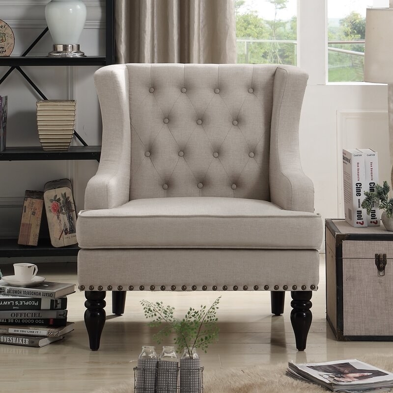 The tufted chair in beige