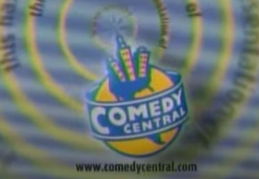 tall city buildings coming out of the earth wrapped in a banner that says comedy central