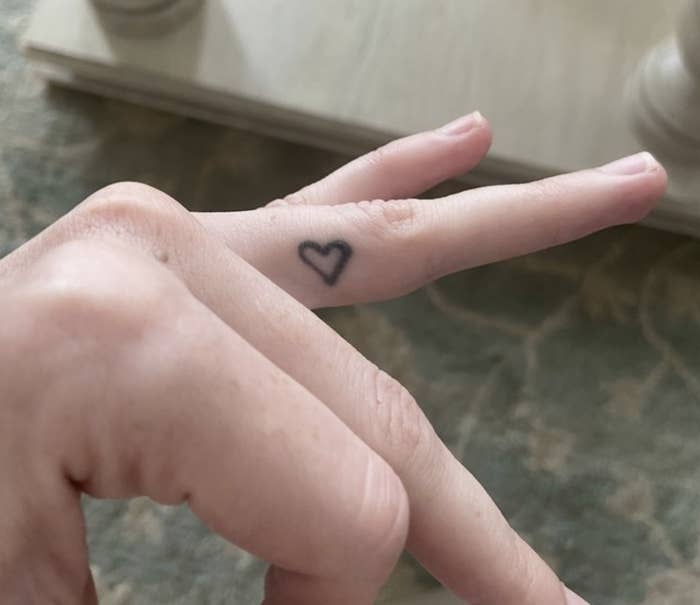 broken heart finger tattoo