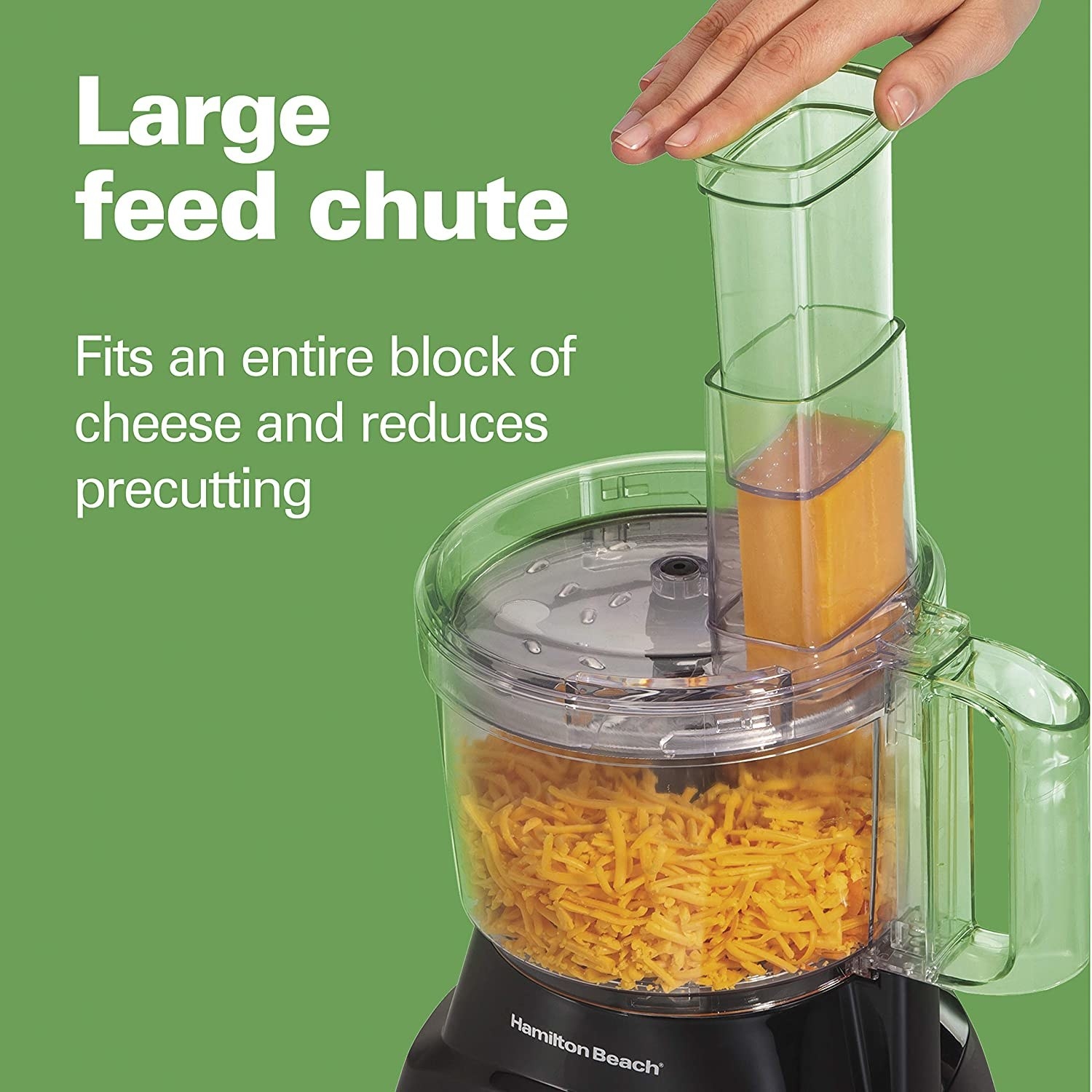 The food processor, which has a large feed chute that can fit an entire block of cheese