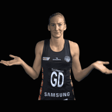 Netball player shrugging their shoiulders