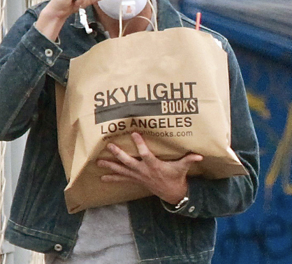 a closeup of the brown paper bag of books that says &quot;Skylight Books Los Angeles&quot; on it