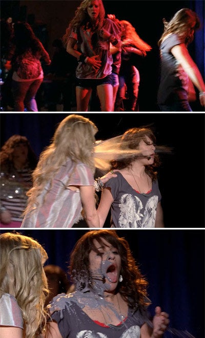 The New Directions perform a song and Britney throws up on Rachel