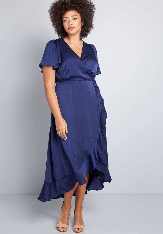 Model wearing the dress in dark blue 
