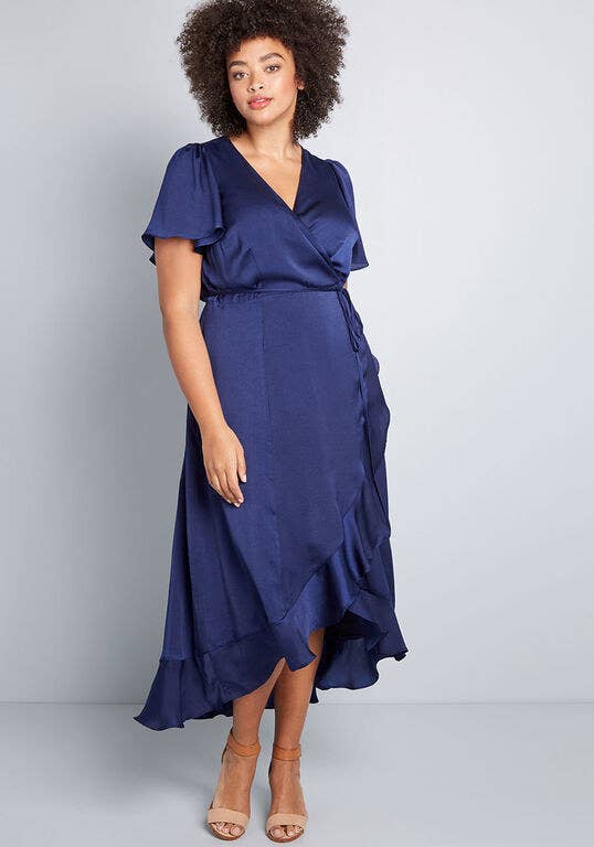 Model wearing the dress in dark blue