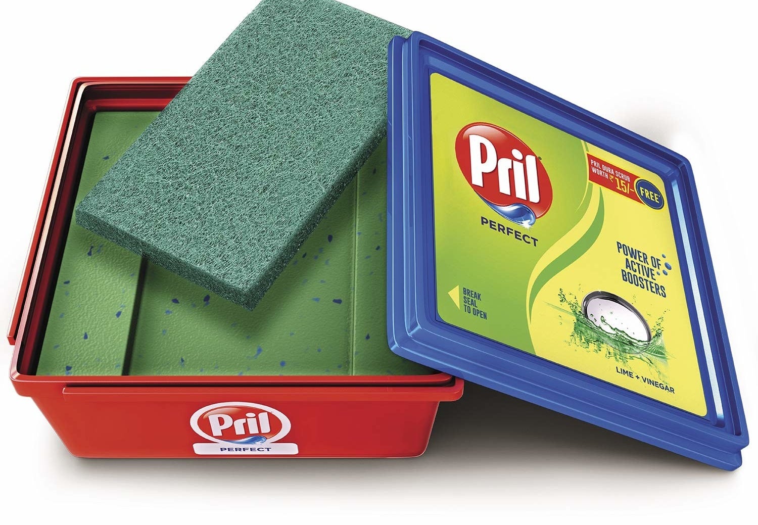 A Pril diswashing bar in a box with a cleaning scrub placed on top.