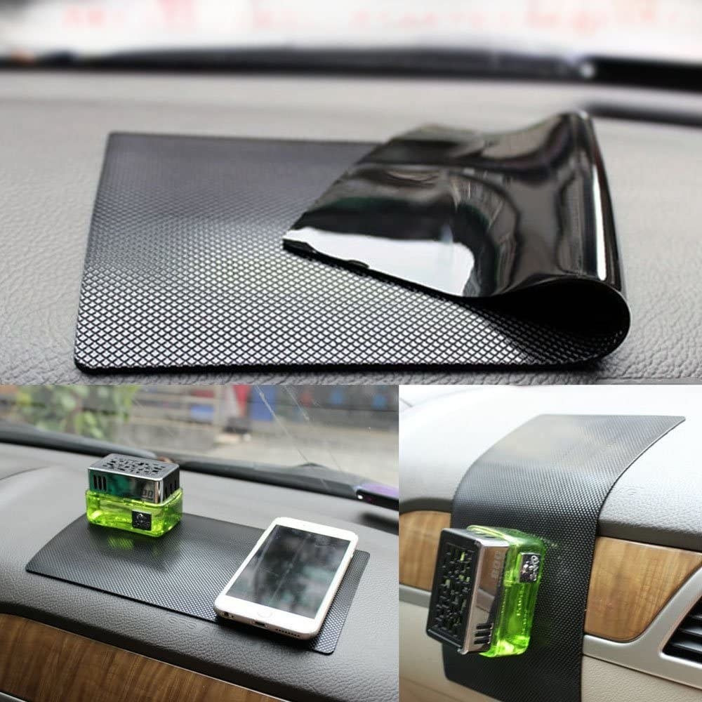 A phone and mini diffuser on a dashboard pad