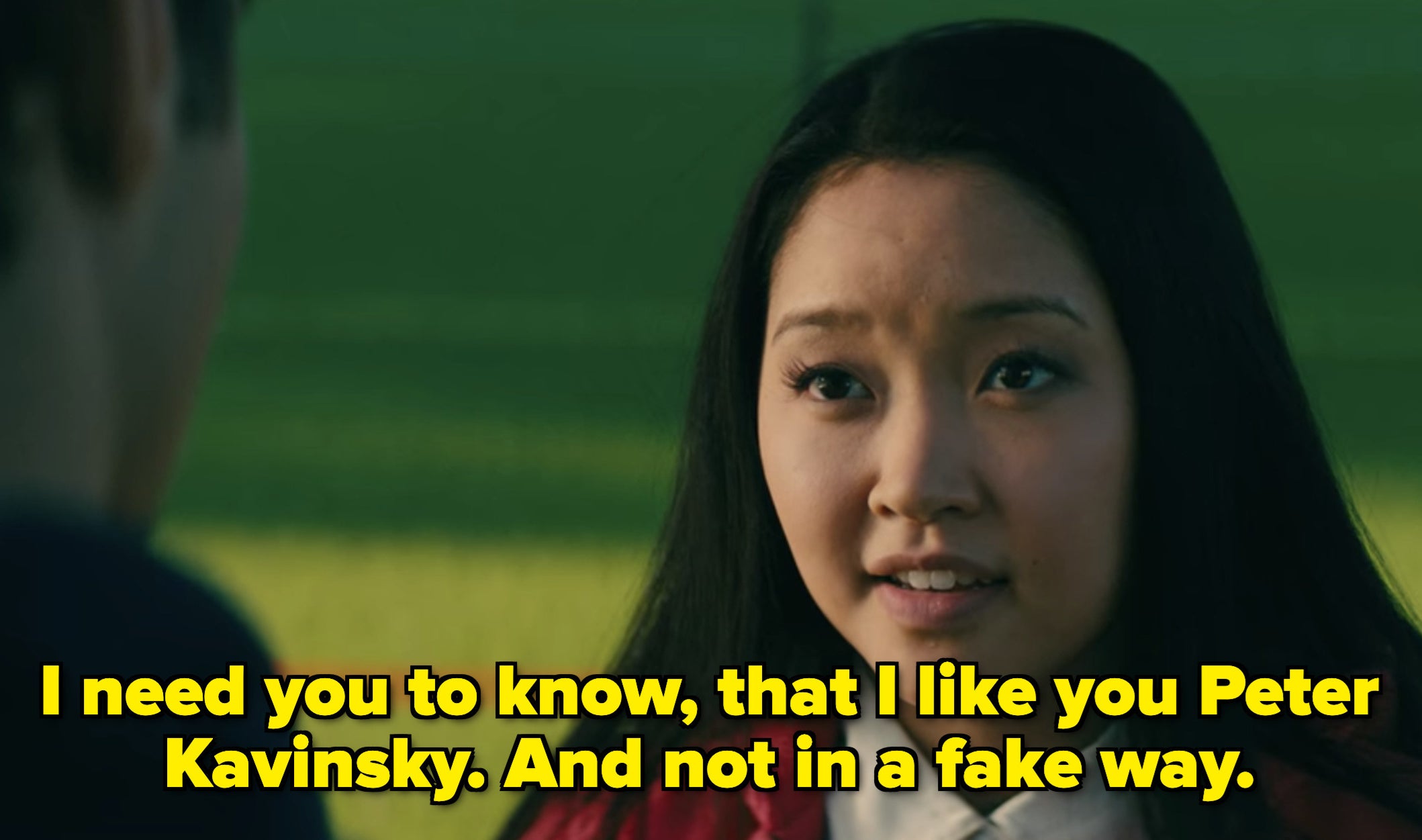 Lara Jean telling Peter that she likes him, and not in a fake way. 