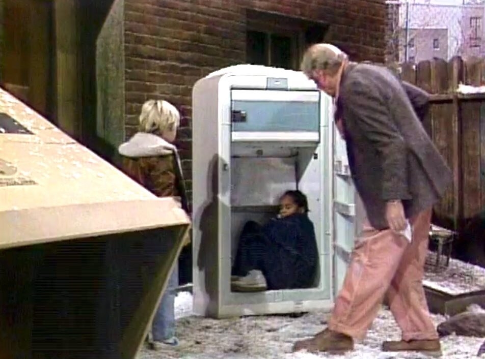 Cherie being discovered passed out inside an old fridge in the backyard