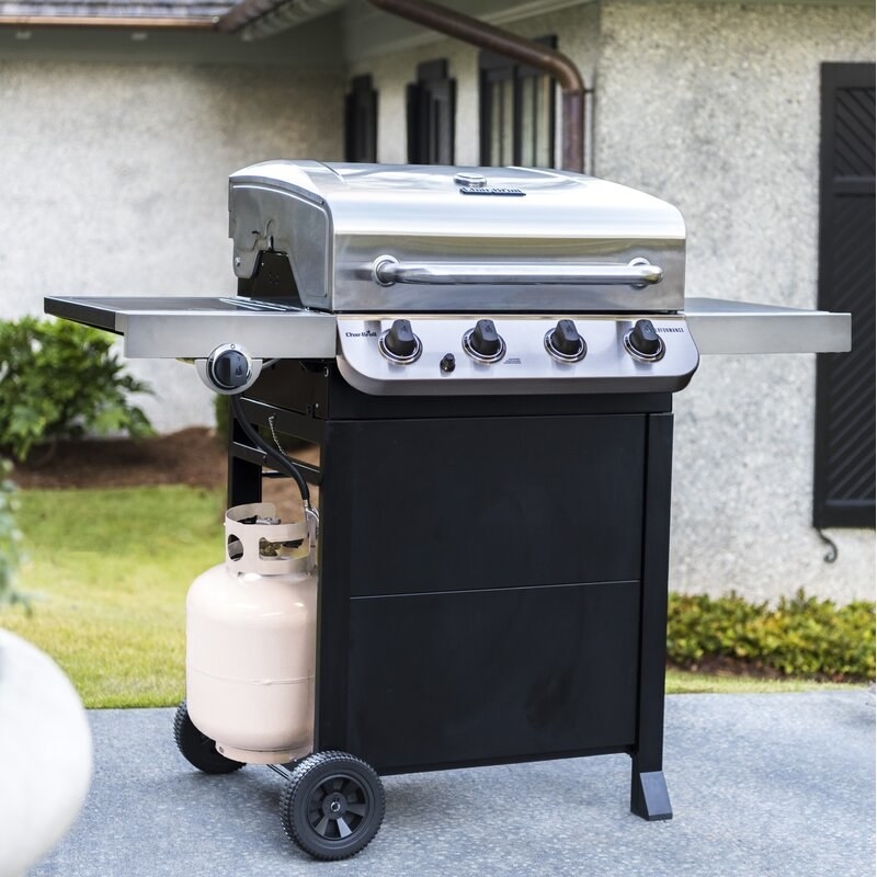 The grill with its stainless steel lid down