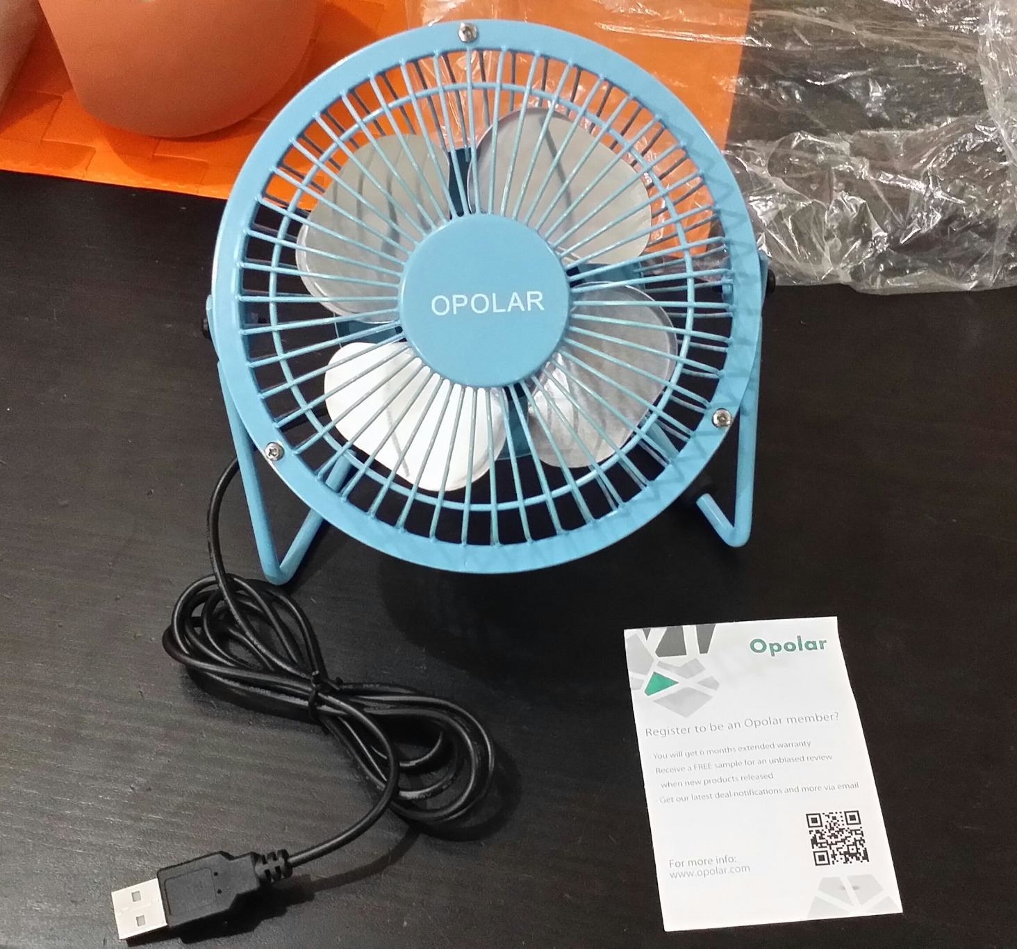 The small, light blue fan with a USB cord