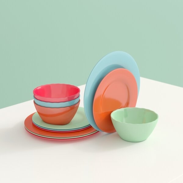 set of colorful melamine plates and bowls