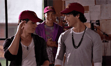 Joe and Nick Jonas high fiving