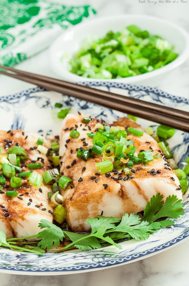 Steamed white fish in a soy ginger sauce with fresh cilantro.