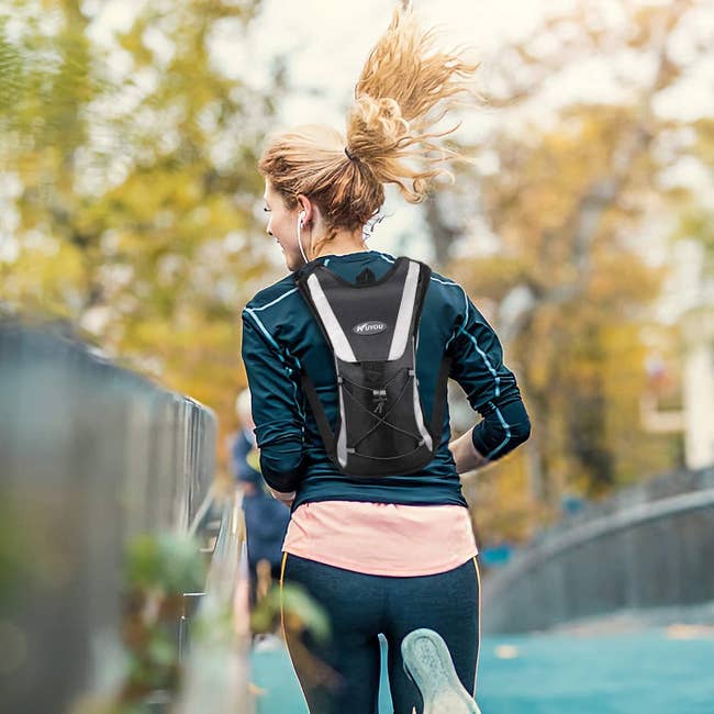 A runner with the backpack on 