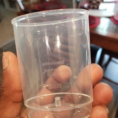 A close up of the cup meant for pouring water with measuring spots for "Hard", "medium," and "soft"
