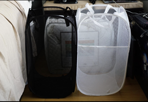 The two hampers standing upright 