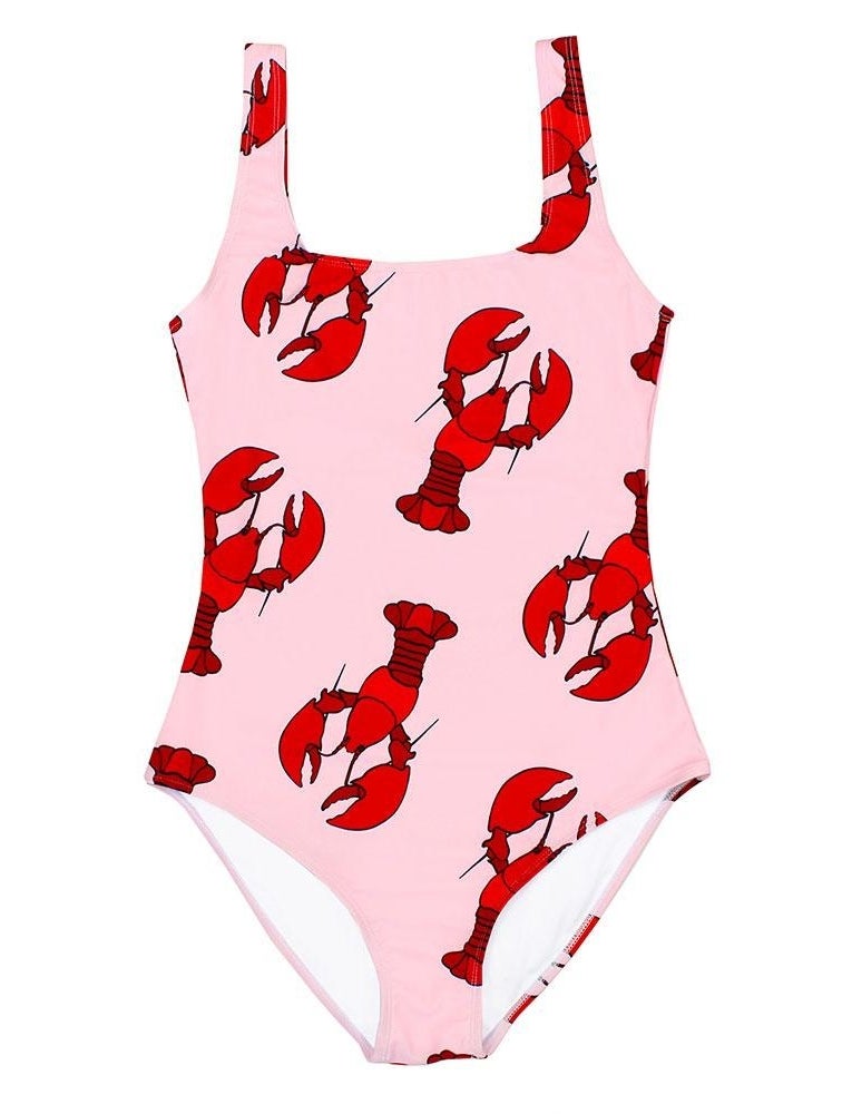 a pink swimsuit with red lobster illustrations  