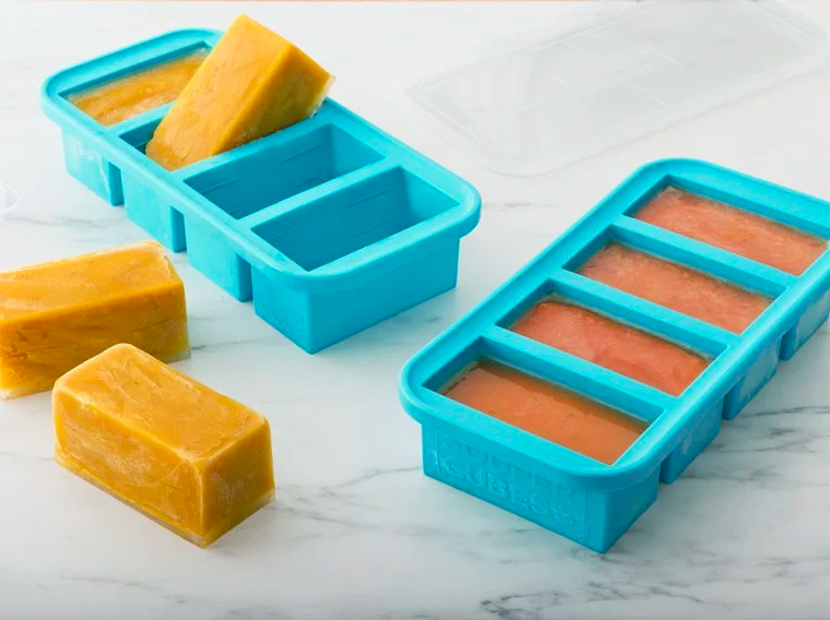 two ice cube-like trays with larger portion compartments 