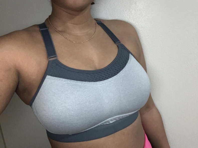 A reviewer in the gray version of the bra 
