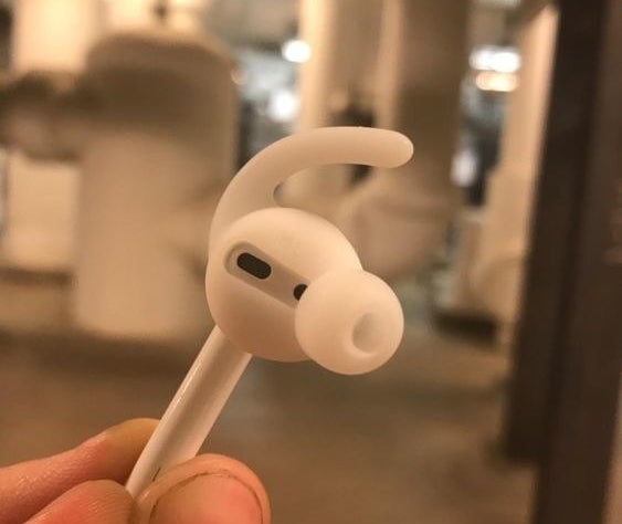 Reviewer&#x27;s picture of the silicone ear hook on their AirPod