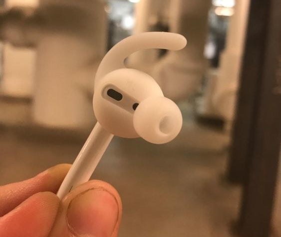 Reviewer&#x27;s picture of the silicone ear hook on their AirPod