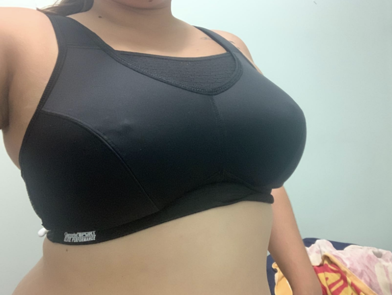 A reviewer in the black bra 