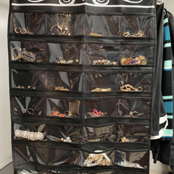 the jewelry organized in the holder