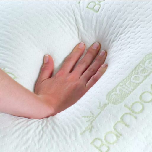 hand pressing into the pillow