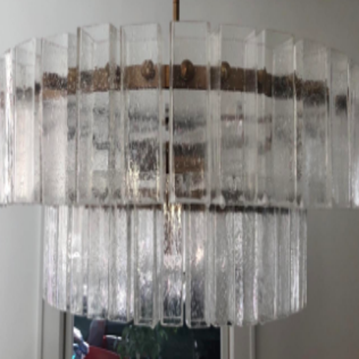 The same chandelier after using this cleaning spray, the panels are now considerably brighter and no longer cloudy