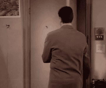 Ross from &quot;friends&quot; exiting a door, turning around, and saying &quot;cool&quot;