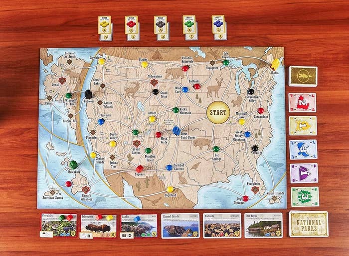 United States board with Nation Parks cards laid out against wooden surface
