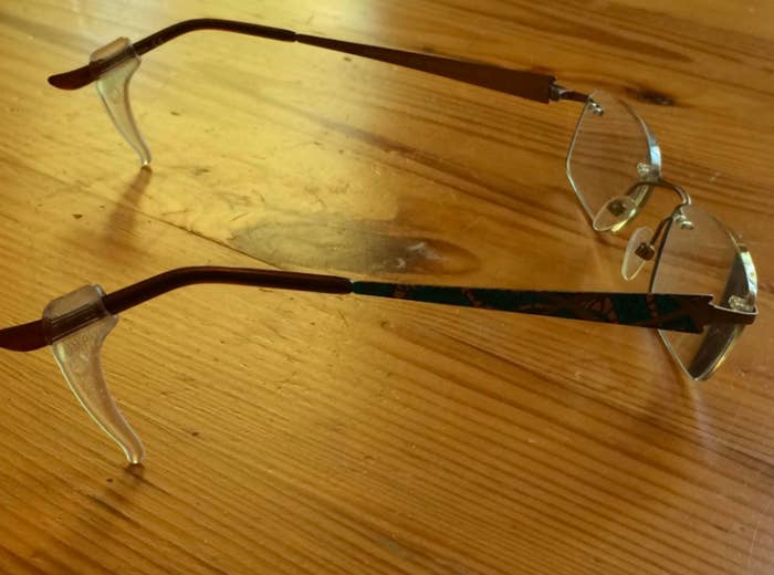 A customer review photo of the Keepons on their glasses