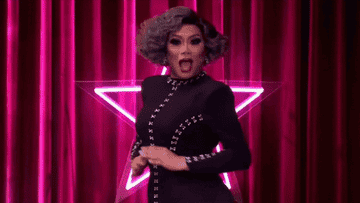 A GIF of Jujubee from her entrance into the Werk Room on All Stars 5 with her name splashed across in purple letters 