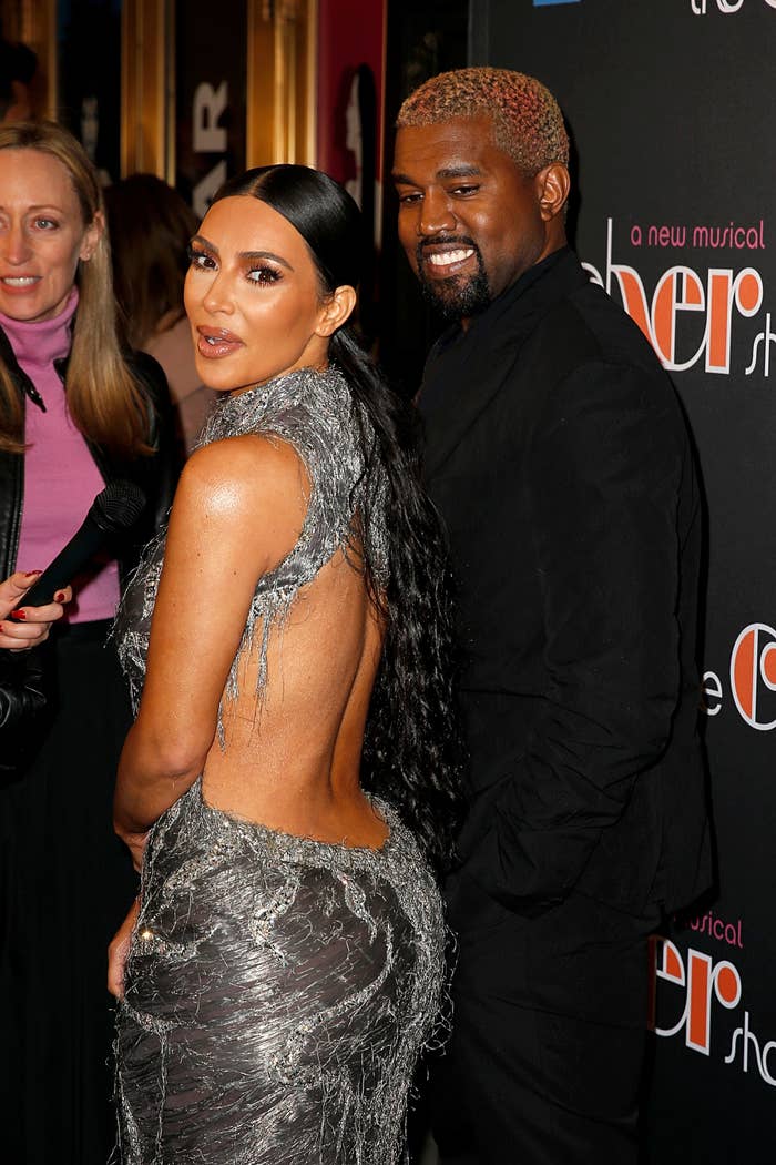 Kim and Kanye smiling in happier times