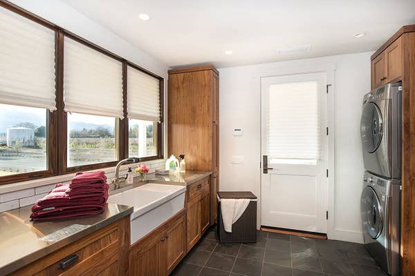 Multiple kitchen windows with the pleated shades